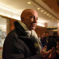 Tom Barrack speaks with members of the press at Trump Tower in New York City in January 2017. | REUTERS