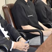 Family members of the victims who were killed by Kosei Homi in Yamaguchi Prefecture in 2013 attend a news conference in Tokyo after the Supreme Court finalized Homi\'s death sentence on Thursday. | KYODO
