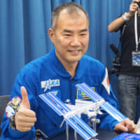 Astronaut Soichi Noguchi will send messages of encouragement from space during torch relays for the 2020 Tokyo Olympics and Paralympics. | KYODO