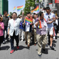 People march in the Tokyo Rainbow Pride parade in May 2018. | YOSHIAKI MIURA