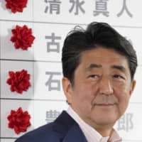 In the wake of Sunday\'s election, Prime Minister Shinzo Abe must now think twice about moving forward on constitutional revision. | BLOOMBERG