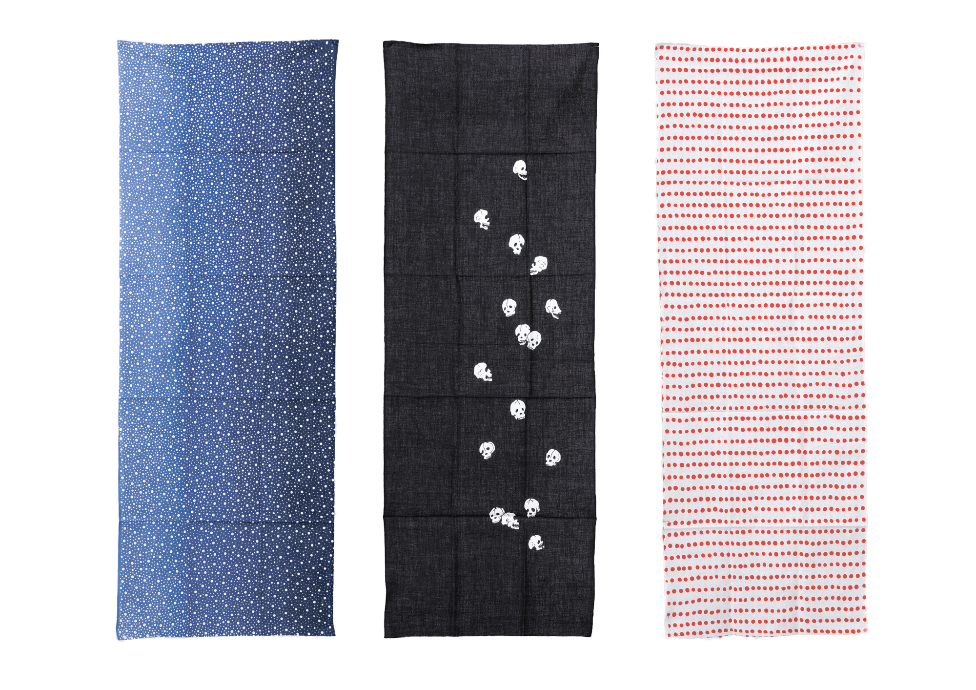 From left: Edo Komon's dense patterning of tiny dots, conceptualized as hail stones. Viewed from the side, the delicate gradiation appears like a landscape against the sky; in yet another play on words, a succession of skulls is read as kotsu-kotsu-to, meaning 'steadily' or 'diligently'; the most common tenugui towel design uses a traditional resist-dye technique. It colors the dots irregularly — wherein lies its appeal.