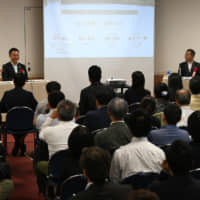 Leaders from municipalities discuss efforts to rejuvenate local areas at the Japan Times Satoyama Consortium symposium in Tokyo on June 4. | YOSHIAKI MIURA