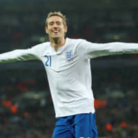 Former England striker Peter Crouch is seen celebrating his goal against France in a 2017 friendly at Wembley Stadium in London.  | REUTERS