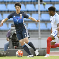 Japan U-23 defender Sai van Wermeskerken dribbles the ball during a 2016 Toulon Tournament match against England in Toulon, France. Van Wermeskerken is set to join PEC Zwolle in the Dutch first division. | KYODO