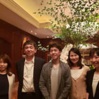 Vincent Zhou (center) poses with coach Mie Hamada (second from right) and Kinoshita Group CEO Naoya Kinoshita (second from left) in Osaka last week after the company agreed to sponsor the American skater. | SOURCE: INSTAGRAM