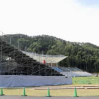 Officials on Wednesday announced the completion of temporary stands at Kamaishi Recovery Memorial Stadium in Kamaishi, Iwate Prefecture. The venue will host two Rugby World Cup games later this year. | CHUNICHI SHIMBUN