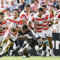 The Brave Blossoms\' Kenki Fukuoka runs with the ball against Fiji in the first half of a Pacific Nations Cup pool-stage match on Saturday afternoon in Kamaishi, Iwate Prefecture. | KYODO