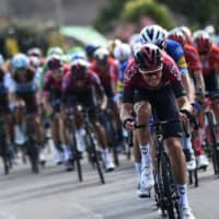 Geraint Thomas (right) and other cyclists ride in a group in the back of the race during the 10th stage of the 106th edition of the Tour de France on Monday. | AFP-JIJI