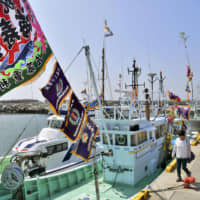 A ceremony to celebrate the return of fishing vessels for the first time since the 2011 Fukushima nuclear disaster was held at Tomioka port on Friday. With the reopening of the Tomioka facility, all 10 of Fukushima Prefecture\'s fishing ports are now back in operation. | KYODO