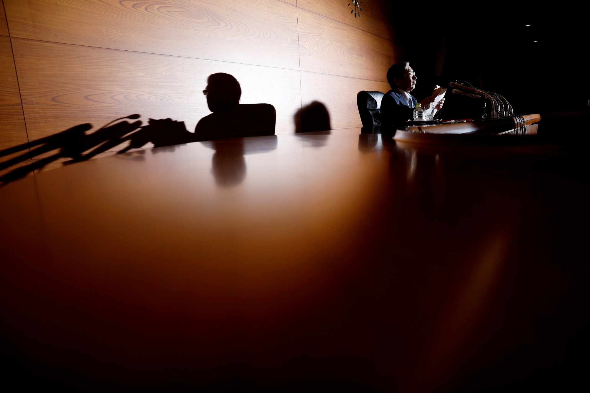 Bank of Japan Gov. Haruhiko Kuroda attends a news conference at BOJ headquarters in Tokyo on July 30. | REUTERS