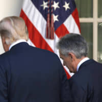 U.S. President Donald Trump leaves the Rose Garden with Jerome Powell, his nominee to become chairman of the U.S. Federal Reserve, at the White House in Washington in 2017. | REUTERS