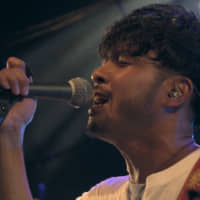 One last song: Kenny serenades his love interest at a live gig on \"Terrace House Tokyo 2019-2020.\" | © FUJI TELEVISION / EAST ENTERTAINMENT