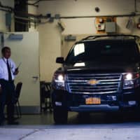 A car reportedly carrying the body of financier Jeffrey Epstein arrives at the medical examiner after he was found dead in his cell in the Manhattan Correctional Center of New York City Saturday. | REUTERS