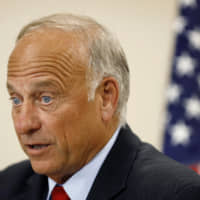 U.S. Rep. Steve King speaks during a town hall meeting Tuesday in Boone, Iowa. The Iowa Republican is defending his call for a ban on all abortions by questioning whether \"there would be any population of the world left\" if not for births due to rape and incest. Speaking Wednesday before a conservative group in the Des Moines suburb of Urbandale, he reviewed legislation he has sought that would outlaw abortions without exceptions for rape and incest. | AP