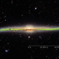 An illustration made from 3D mapping shows the warped shape of the stellar disk of our Milky Way galaxy, with distances noted in light-years. | REUTERS