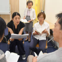 Miho Ohashi takes a lesson at the International Medical Interpreter Academy in Tokyo on July 23. | SATOKO KAWASAKI