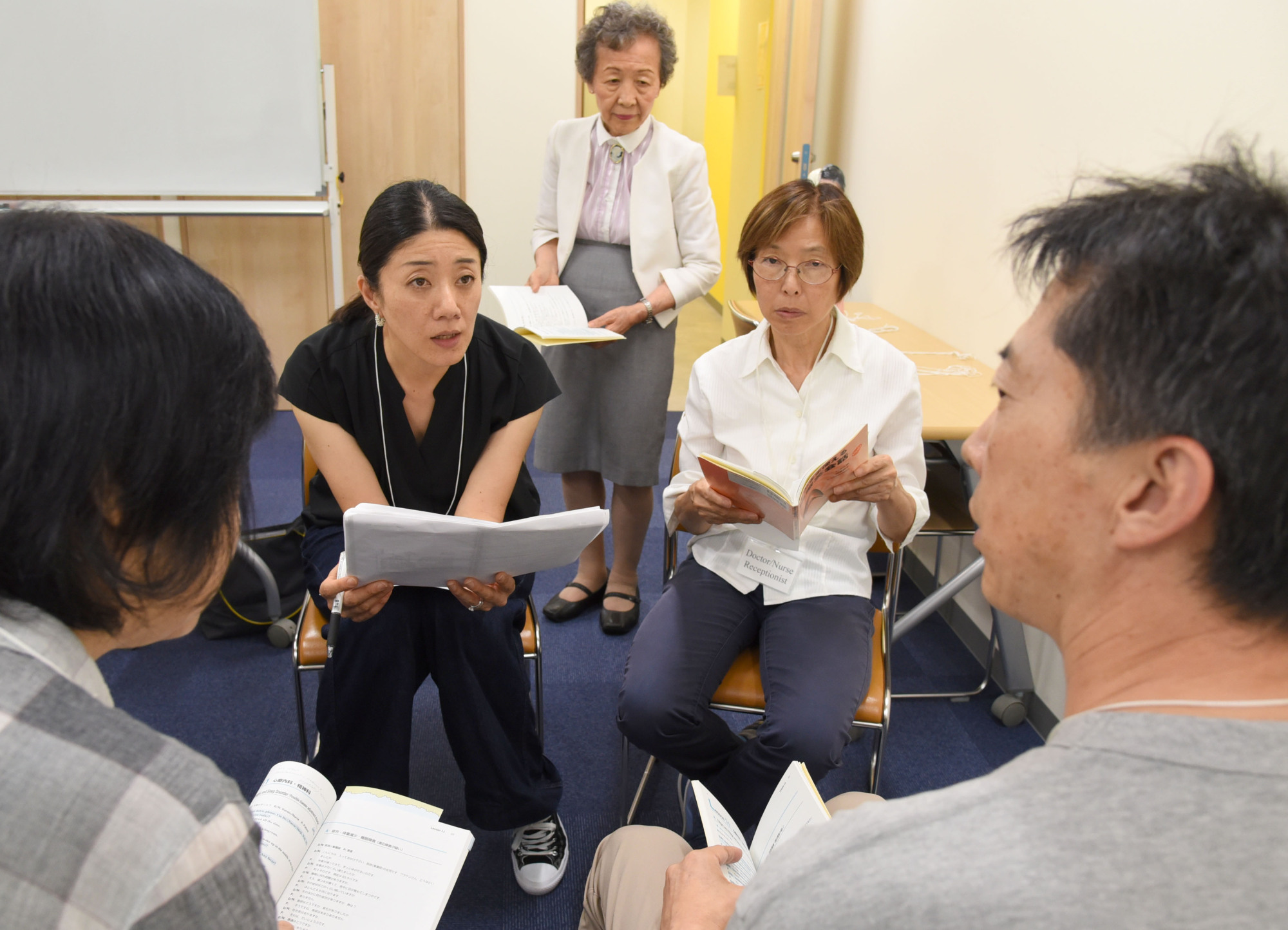 Miho Ohashi takes a lesson at the International Medical Interpreter Academy in Tokyo on July 23. | SATOKO KAWASAKI