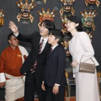 Crown Prince Akishino, Crown Princess Kiko and their 12-year-old son, Prince Hisahito, visit the National Museum of Bhutan in the west Bhutan town of Paro on Saturday. | KYODO