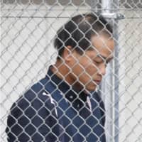 Fumio Miyazaki leaves Toride Police Station in Ibaraki Prefecture on Tuesday to be taken to prosecutors. | KYODO