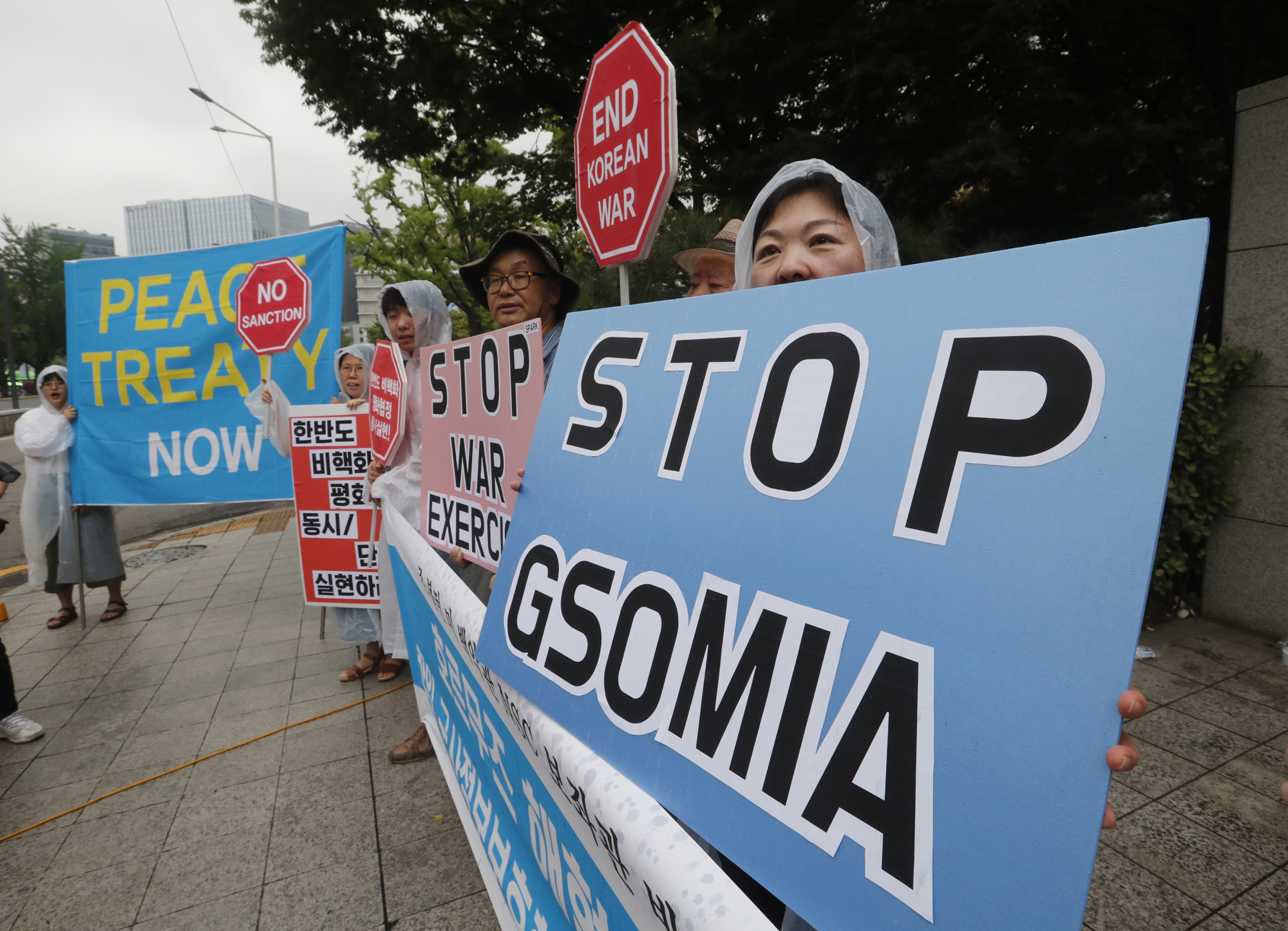 Protesters stage a rally demanding the abolition of the General Security of Military Information Agreement (GSOMIA), an intelligence-sharing agreement between South Korea and Japan, in front of the Foreign Ministry in Seoul on July 24. | AP