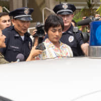 Long arm of the law: Toru Muranishi found himself locked up in Hawaii after falling foul of sex-trafficking laws. | ILLUSTRATION BY ADAM PASION
