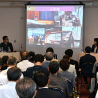 Panelists share their experiences and thoughts on succeeding businesses in rural communities at the Japan Times Satoyama Consortium symposium in Tokyo on June 4. | YOSHIAKI MIURA