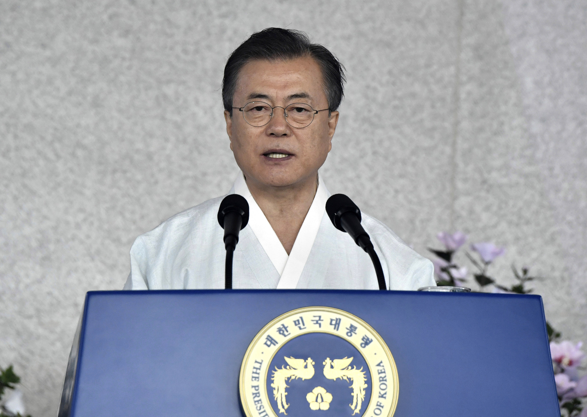 In an Aug. 15 speech marking the 74th anniversary of Korea's liberation from Japanese colonial rule, South Korean President Moon Jae-in extended an olive branch to Japan, saying Seoul will 'gladly join hands' if Tokyo wants to talk. | AP