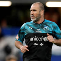 Former Manchester United player Eric Cantona is seen during Soccer Aid, a British charity event, on June 16 in London. | REUTERS