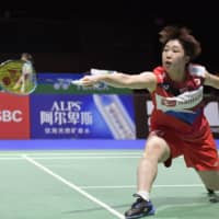 Akane Yamaguchi hits a shot during her match against Yeo Jia-min on Tuesday in Basel, Switzerland.  KYODO | KYODO