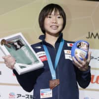 Ai Mori poses for a photo after earning the bronze medal in the women\'s lead at the IFSC Climbing World Championships in Hachioji on Thursday. | KYODO