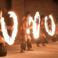 A Samoan fire knife dance is performed at a hot spring resort in Iwaki, Fukushima Prefecture, on Aug.1. | KYODO