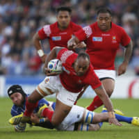 Tonga, seen in action at the 2015 Rugby World Cup, has struggled financially to provide resources for its players. | REUTERS