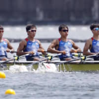 Japan\'s men\'s quad scull team competes in the world junior rowing championships on Saturday at Sea Forest Waterway in Tokyo. Several athletes were treated for symptoms of heatstroke on Sunday as temperatures hit 34 degrees Celsius. | KYODO
