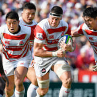 The Brave Blossoms play against Tonga. | KYODO