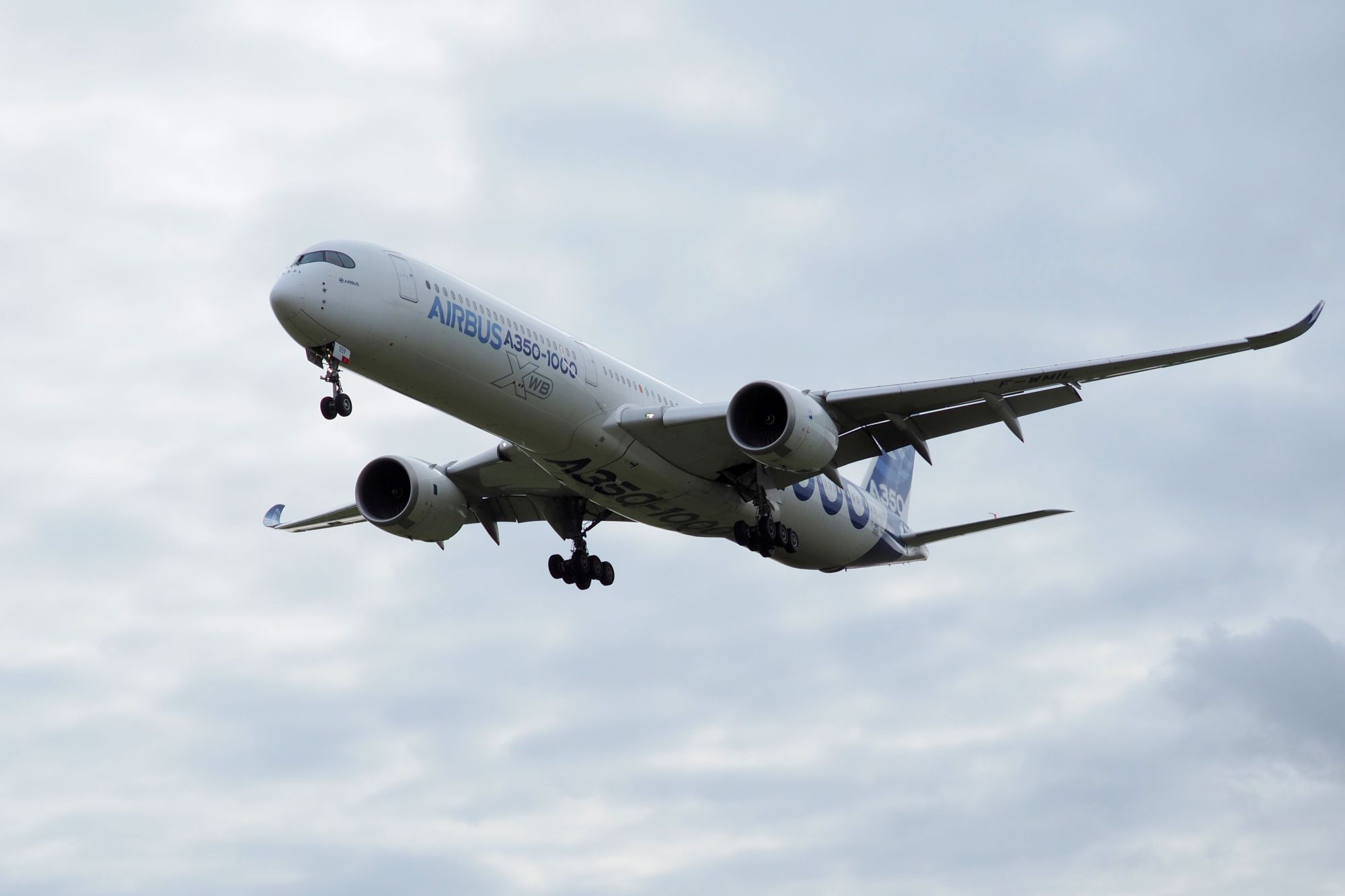 An Airbus A350-1000 conducts a test flight over Chateauroux airport, central France, in February. European aerospace giant Airbus has been hit by a series of attacks by hackers who targeted its suppliers in their search for commercial secrets, security sources told AFP, adding they suspected a China link. | AFP-JIJI