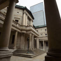 Japanese banks could begin imposing maintenance fees for retail deposit account holders if the Bank of Japan deepens negative interest rates from minus 0.1 percent, according to a JPMorgan Chase &amp; Co. analyst. | BLOOMBERG