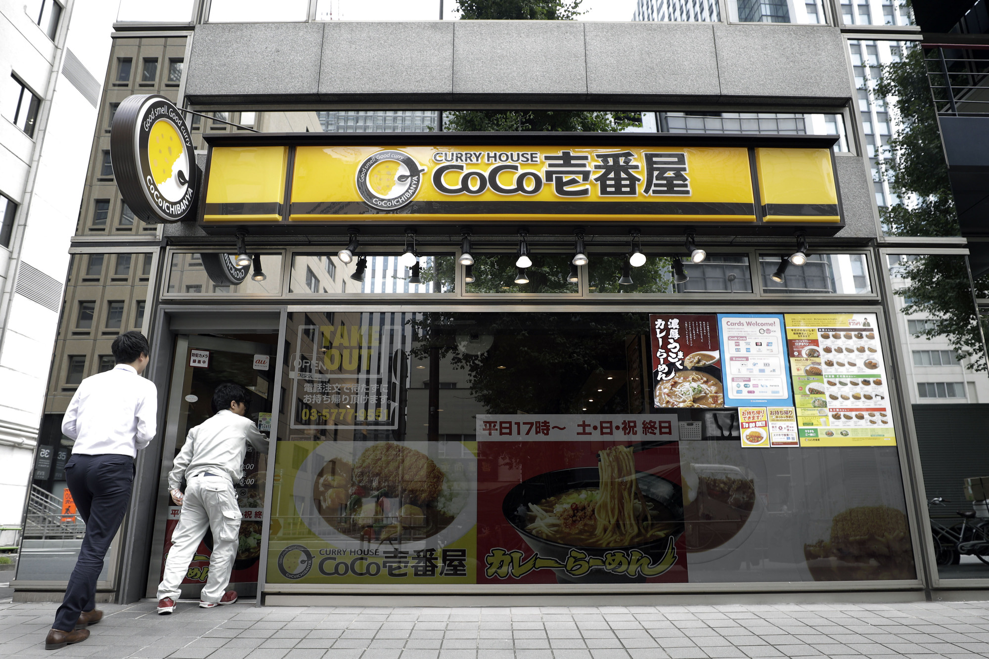 Customers enter a Curry House Coco Ichibanya restaurant, operated by Ichibanya Co., in Tokyo on Sept. 5. | BLOOMBERG