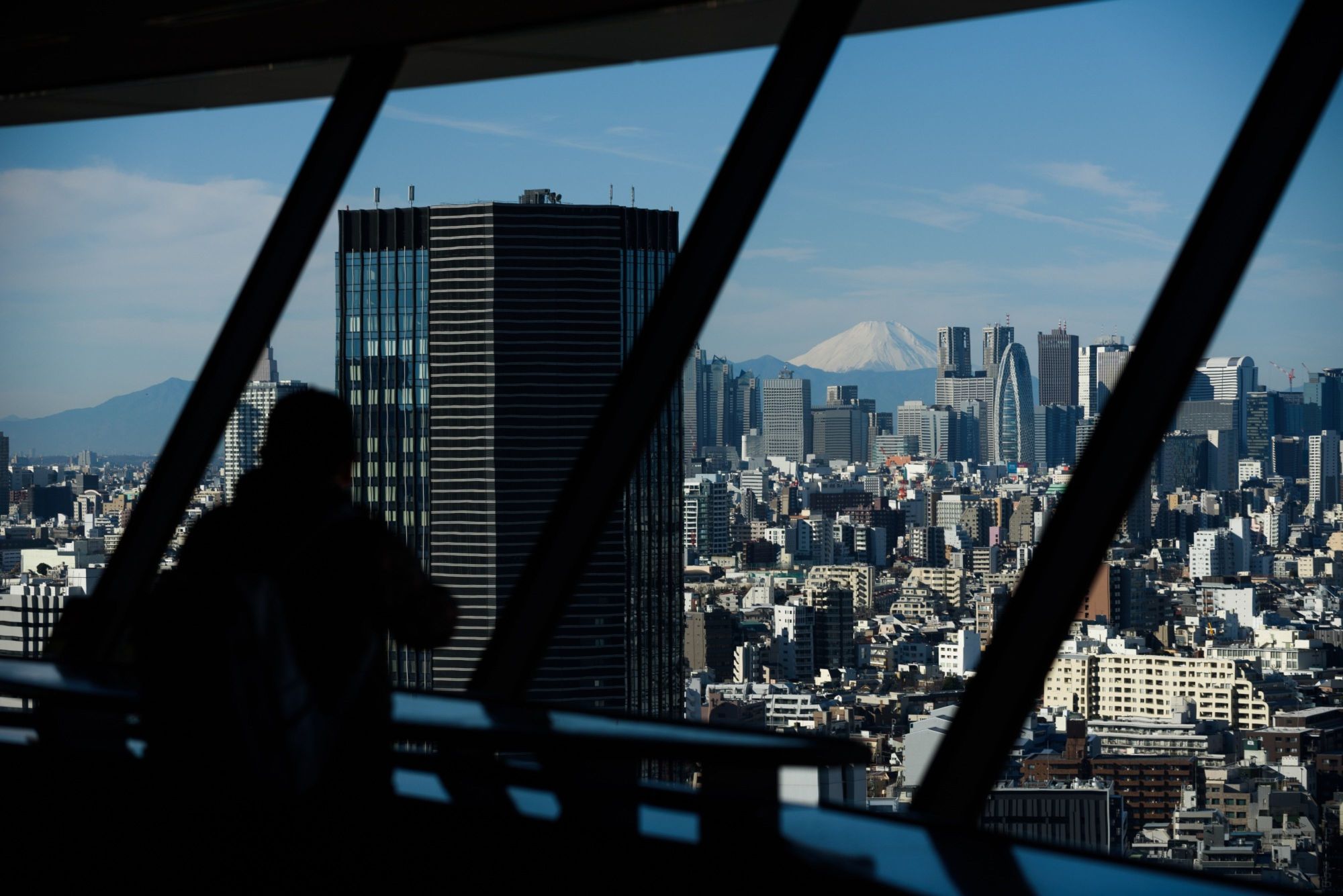 The economy expanded at a slower pace in the April-June quarter than initially reported. | BLOOMBERG