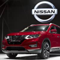 A Nissan Rogue SUV is displayed at the 2017 New York International Auto Show. | BLOOMBERG