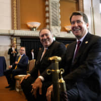 Secretary of State Mike Pompeo takes his seat next to U.S. Ambassador to Japan William Hagerty (right) as they arrive for a news conference by President Donald Trump in Osaka June 29. Hagerty has officially filed to run for Tennessee\'s open U.S. Senate seat. | AP