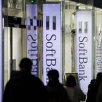 Tokyo-based Monex started selling bonds for SoftBank Group Corp. at 9 a.m. Monday and ran out two minutes and 26 seconds later. | BLOOMBERG