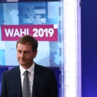 Michael Kretschmer, Saxony\'s state premier and top candidate of his conservative CDU party, takes part in a TV show at the German channel ZDF following the first exit polls in state elections in Saxony on Sunday in Dresden, eastern Germany. | AFP-JIJI