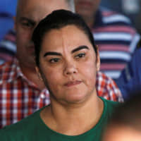 Former Honduran first lady Rosa Elena Bonilla is taken to court in Tegucigalpa on Feb. 28, 2018. | REUTERS