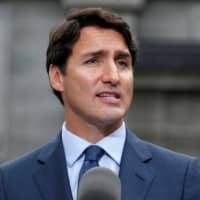 Canadian Prime Minister Justin Trudeau speaks during a news conference in Ottawa Sept. 11. | REUTERS