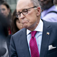 U.S. National Economic Council chief Larry Kudlow pauses while speaking to members of the media outside the White House in Washington on Friday. | BLOOMBERG