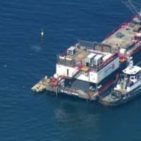 This photo from video provided by KABC-TV shows divers resuming their search Wednesday for the final missing victim who perished in a boat fire off the Southern California coast. The victim is one of 34 who died at sea near Santa Cruz Island when the dive boat Conception burned and sank on Sept. 2. | KABC-TV / VIA AP