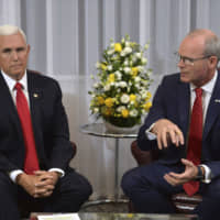 Ireland\'s minister of foreign affair,s Simon Coveney (right), speaks during his meeting with U.S. Vice President Mike Pence after he arrived at Shannon airport for the start of an official visit to Ireland Monday. | JACOB KING / PA / VIA AP