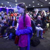 Activist Greta Thunberg attends a press conference where 16 children from across the world present their official human rights complaint on the climate crisis to the United Nations Committee on the Rights of the Child at the UNICEF Building on Monday in New York City. | AFP-JIJI