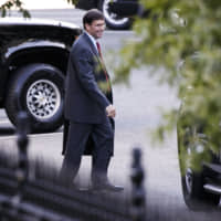 Defense Secretary Mark Esper leaves the White House, Sunday in Washington. Senior U.S. officials, including Vice President Mike Pence and Defense Secretary Esper were seen at the White House Sunday afternoon for a National Security Council meeting over a Saturday attack on Saudi Arabia\'s oil infrastructure that the U.S. has attributed to Iran. | AP